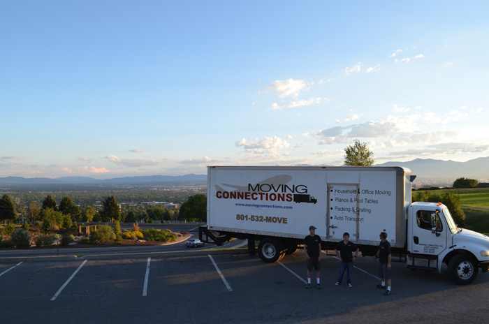 Mike, JC, and C6 next to Moving Connection Truck