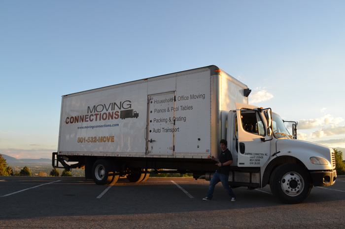 Mike, JC, and C6 next to Moving Connection Truck