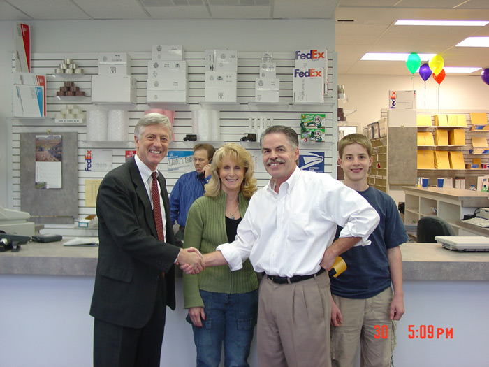 Dad with Mayor Rocky Anderson at the Grand Opening of new store 2003
also Mom, Chris and Paul