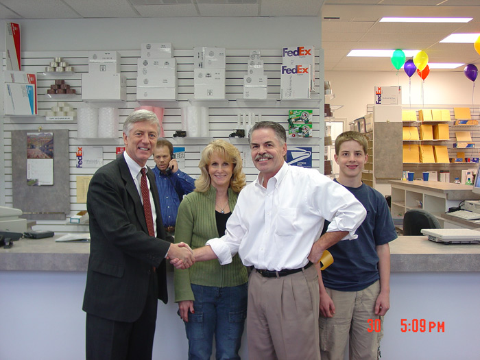 Dad  with Mayor Rocky Anderson at the Grand Opening of new store 2003