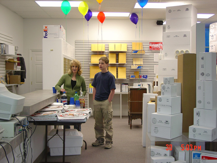 Mom and Chris at the Grand Opening of new store 2003