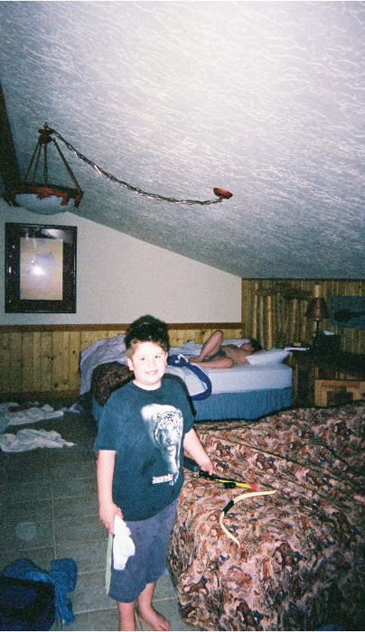 Nicky Boy in one of the cabin rooms at Sorrel River Ranch. ~2003
