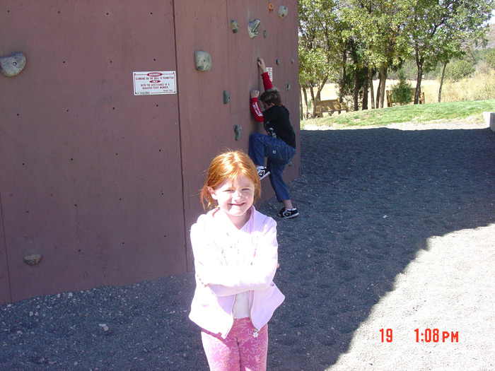 Looking cute next to the rock wall at Zion