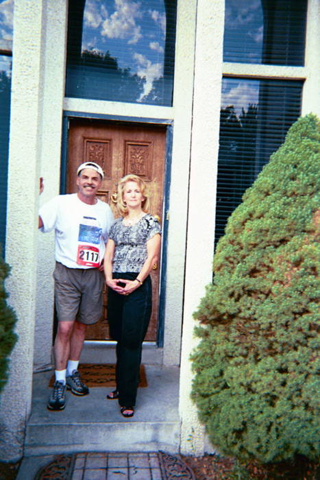 Mom & Dad in front of house before a July 24 10k. ~2001