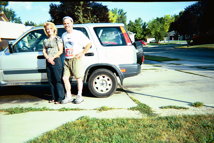 Mom & Dad in front of Honda CRV before a July 24 10k. ~2001