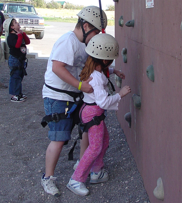Mike helping sister Angel on Rock wall  -  Zion Ponderosa ~2005